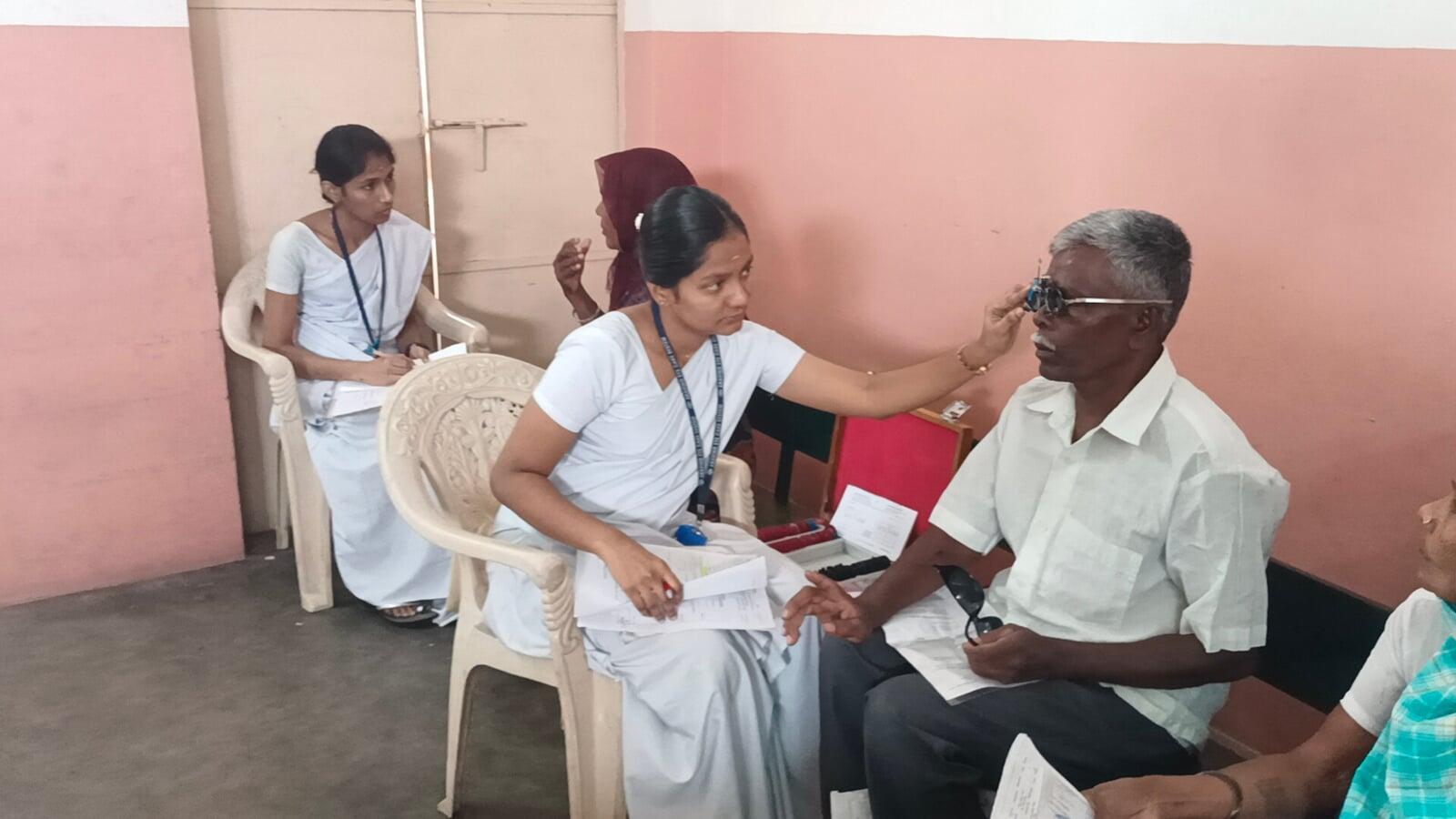 Free eye screening during 27th Cataract Surgery Eye Camp and Doctors examining patients at Free Cataract Surgery Camp