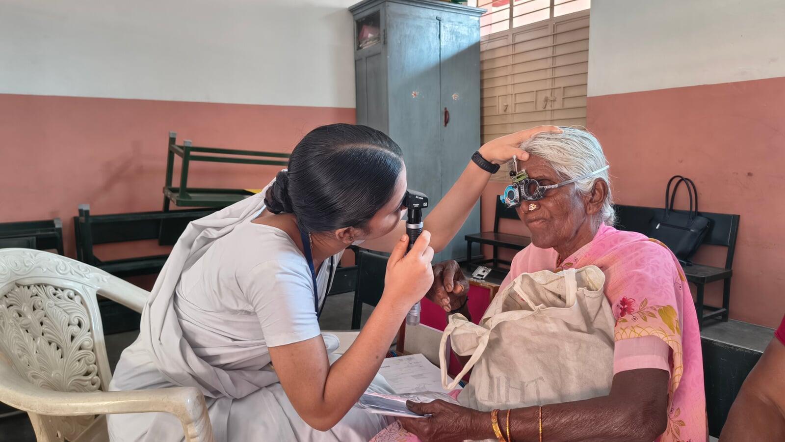 Free eye screening during 29th Cataract Surgery Eye Camp and Doctors examining patients at Free Cataract Surgery Camp
